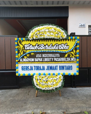 Papan Bunga Duka di Saombo